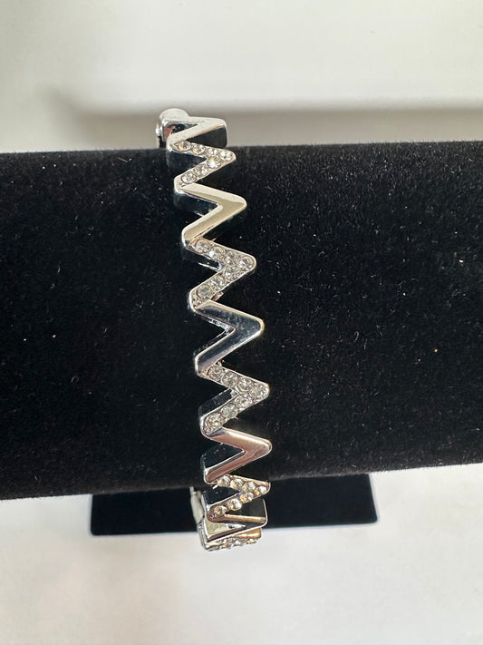Bangle silver color with white stone